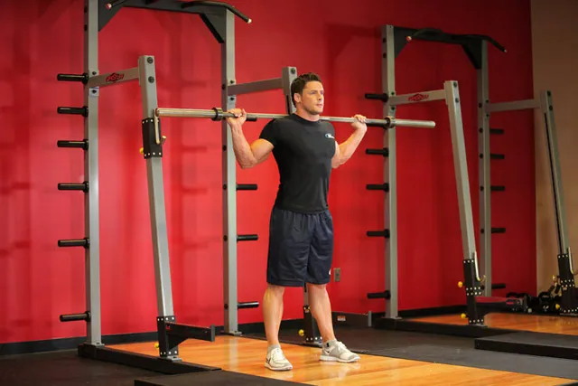 Flexión lateral con barra