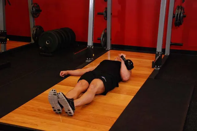 One-Arm Kettlebell Floor Press
