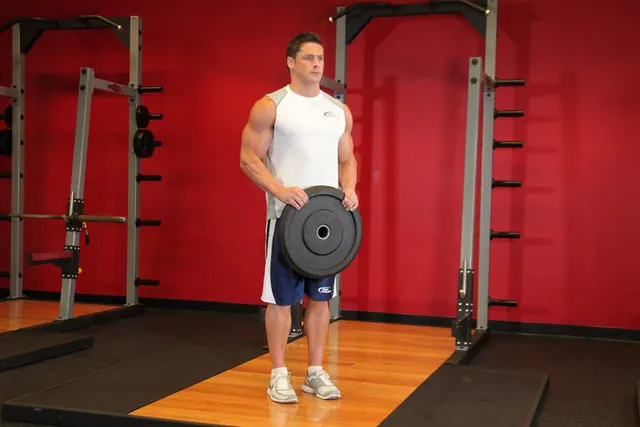 Curl invertido con disco
