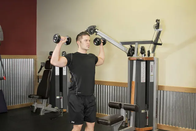 Standing Dumbbell Press