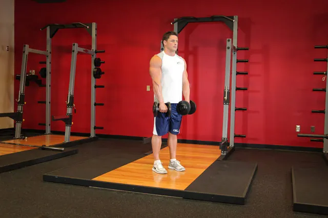 Curl de pie invertido con mancuernas